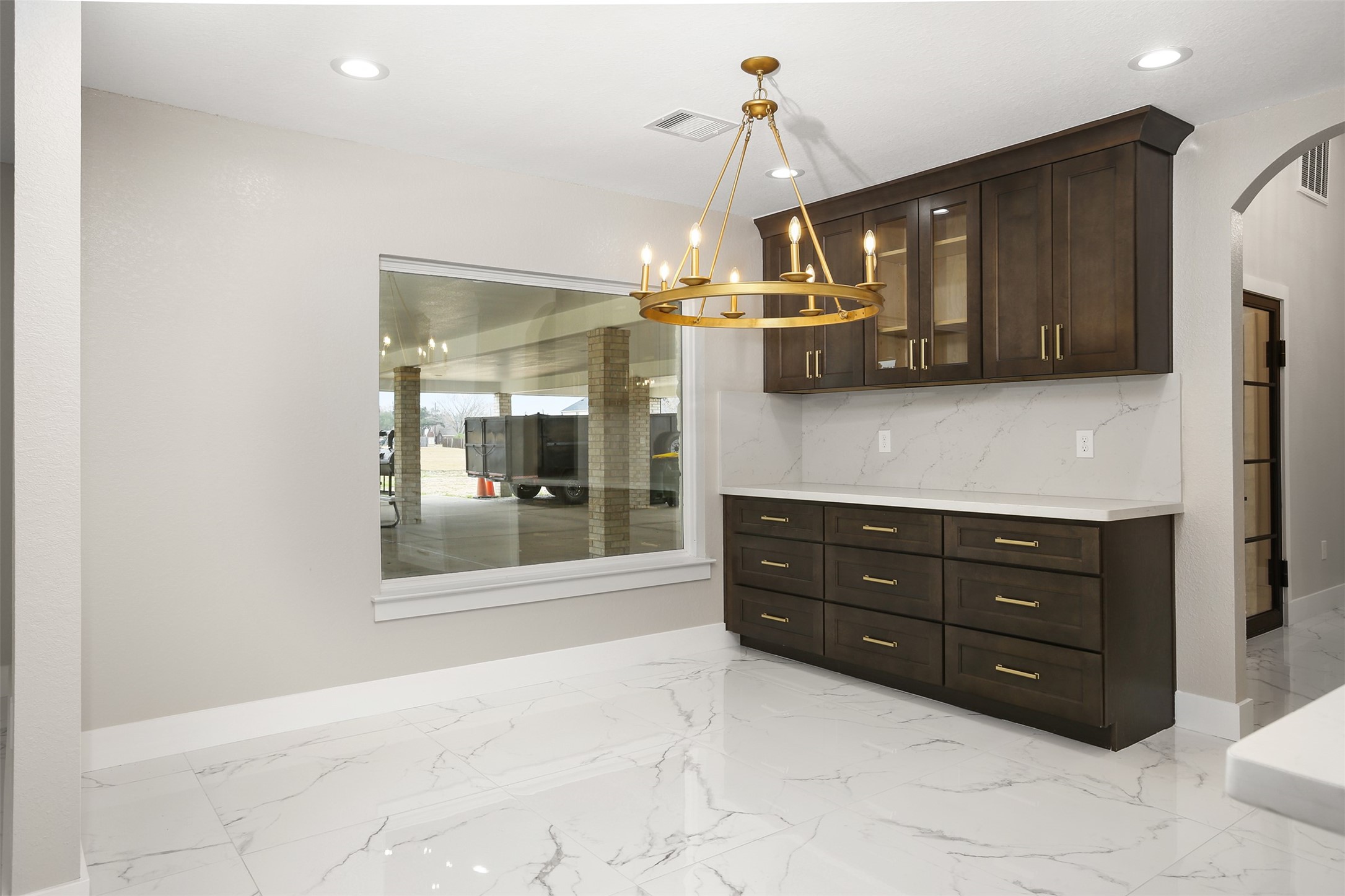 4002 Dixie Farm Road Pearland, TX 77581 - Photo 10 of 29 a view of a kitchen with a sink and cabinets