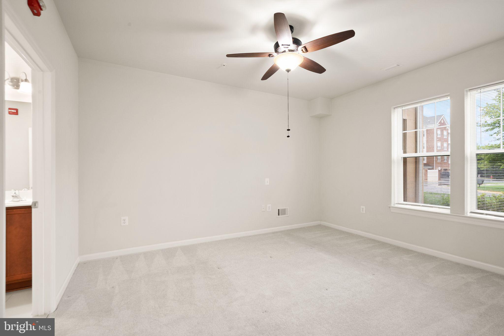 20610 Hope Spring Terrace, Unit 104 Ashburn, VA 20147 - Photo 13 of 38 Bedroom