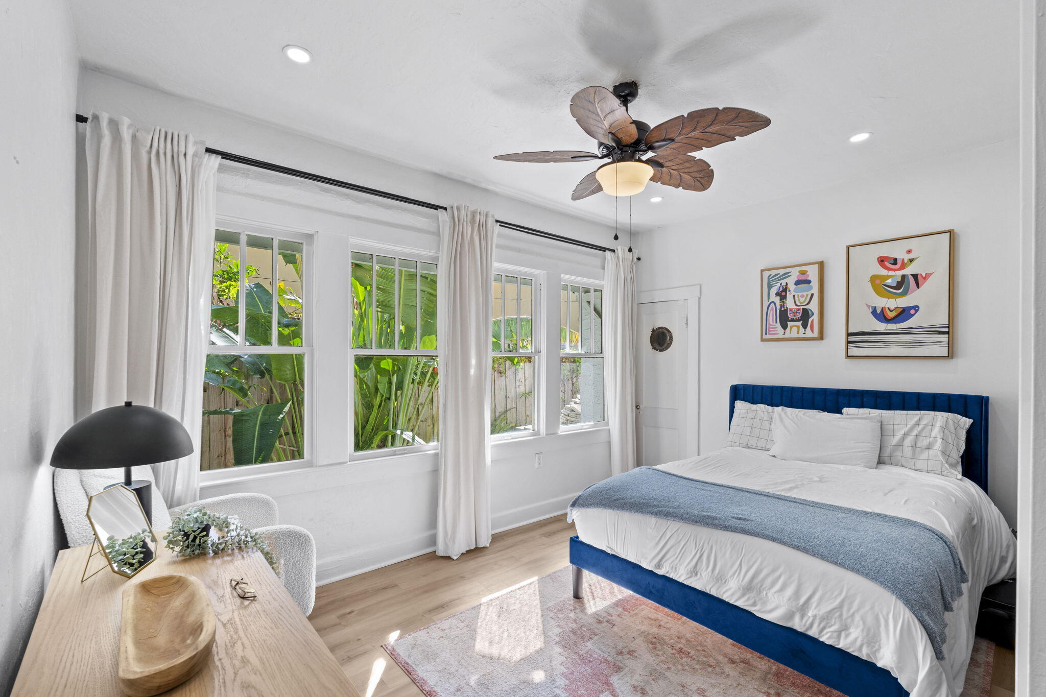 715 Kaye Street West Palm Beach, FL 33405 - Photo 22 of 40 a bedroom with a bed and a window