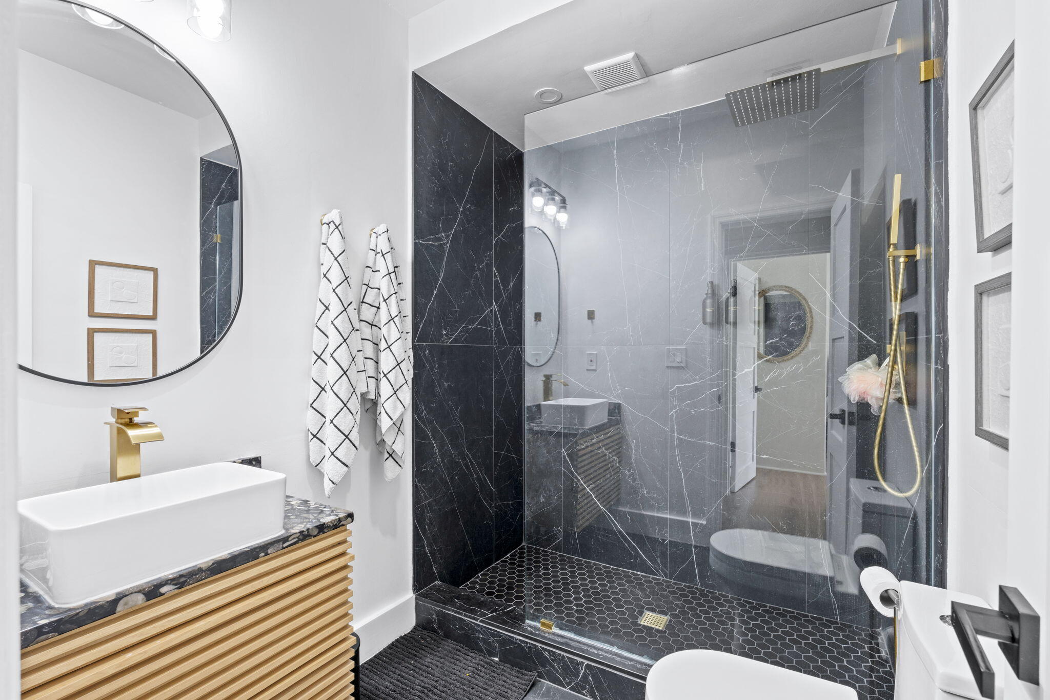 715 Kaye Street West Palm Beach, FL 33405 - Photo 24 of 40 a bathroom with a sink toilet and shower