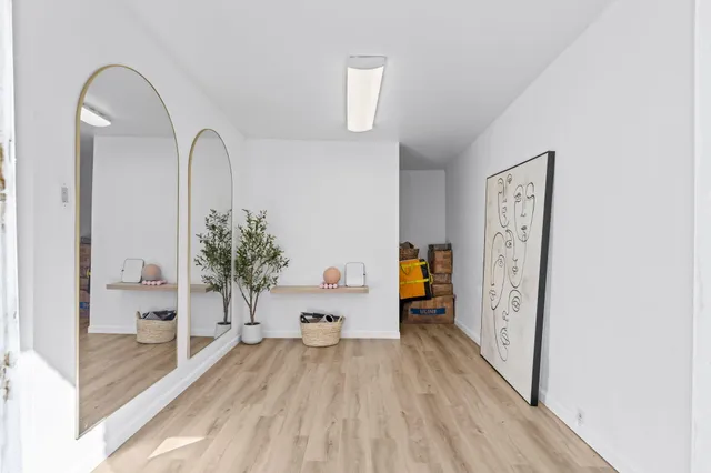 a view of a bedroom from a hallway