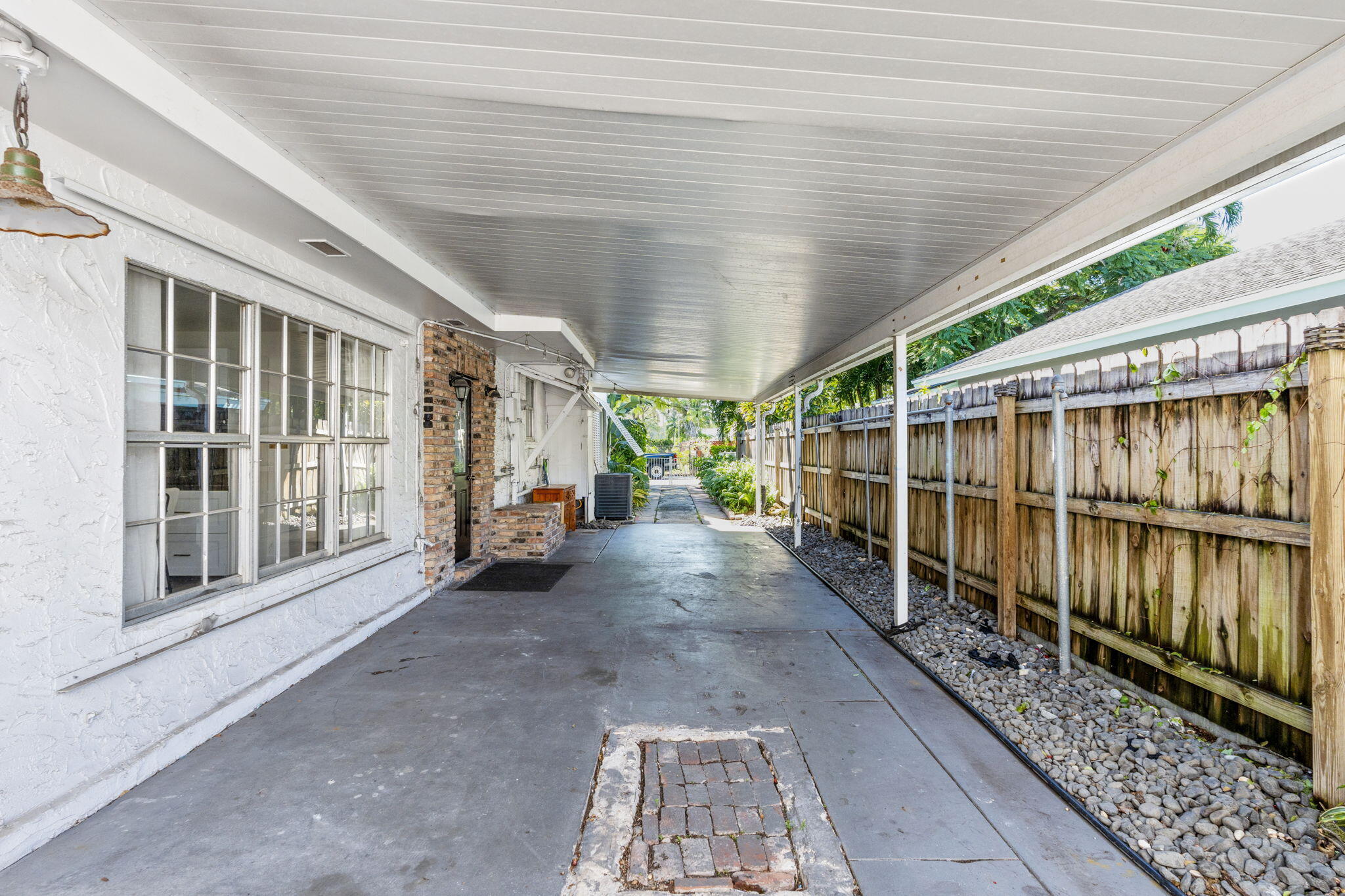 715 Kaye Street West Palm Beach, FL 33405 - Photo 39 of 40 a view of a porch with wooden floor