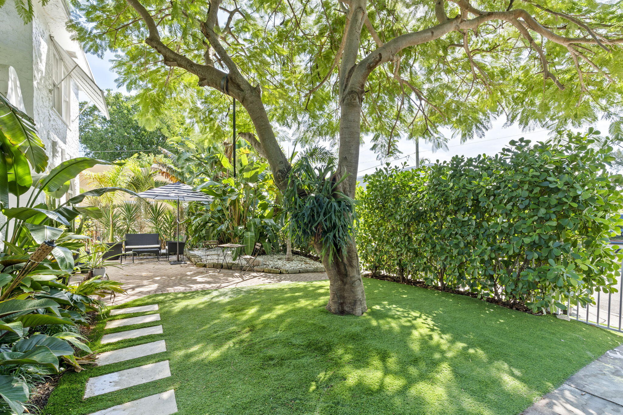 715 Kaye Street West Palm Beach, FL 33405 - Photo 6 of 40 a view of a yard with a tree