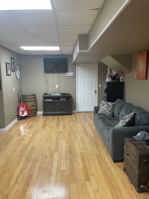 7532 Cherokee Hills Road Fairview, TN 37062 - Photo 14 of 14 a living room with furniture and a wooden floor