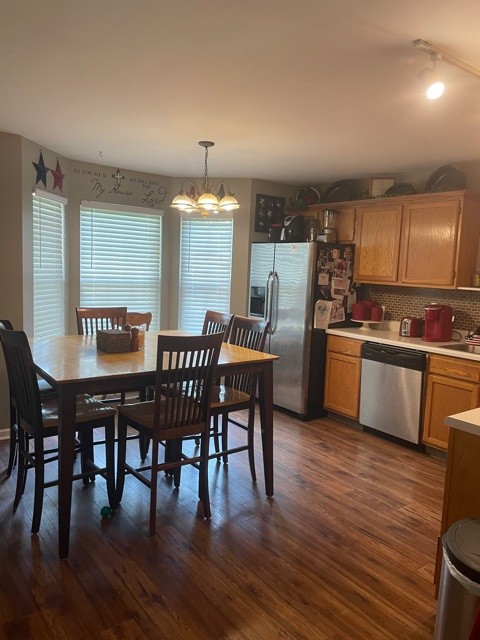 7532 Cherokee Hills Road Fairview, TN 37062 - Photo 6 of 14 a view of a dining room with furniture and wooden floor