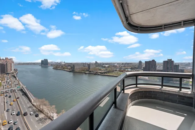a view of a lake from a balcony