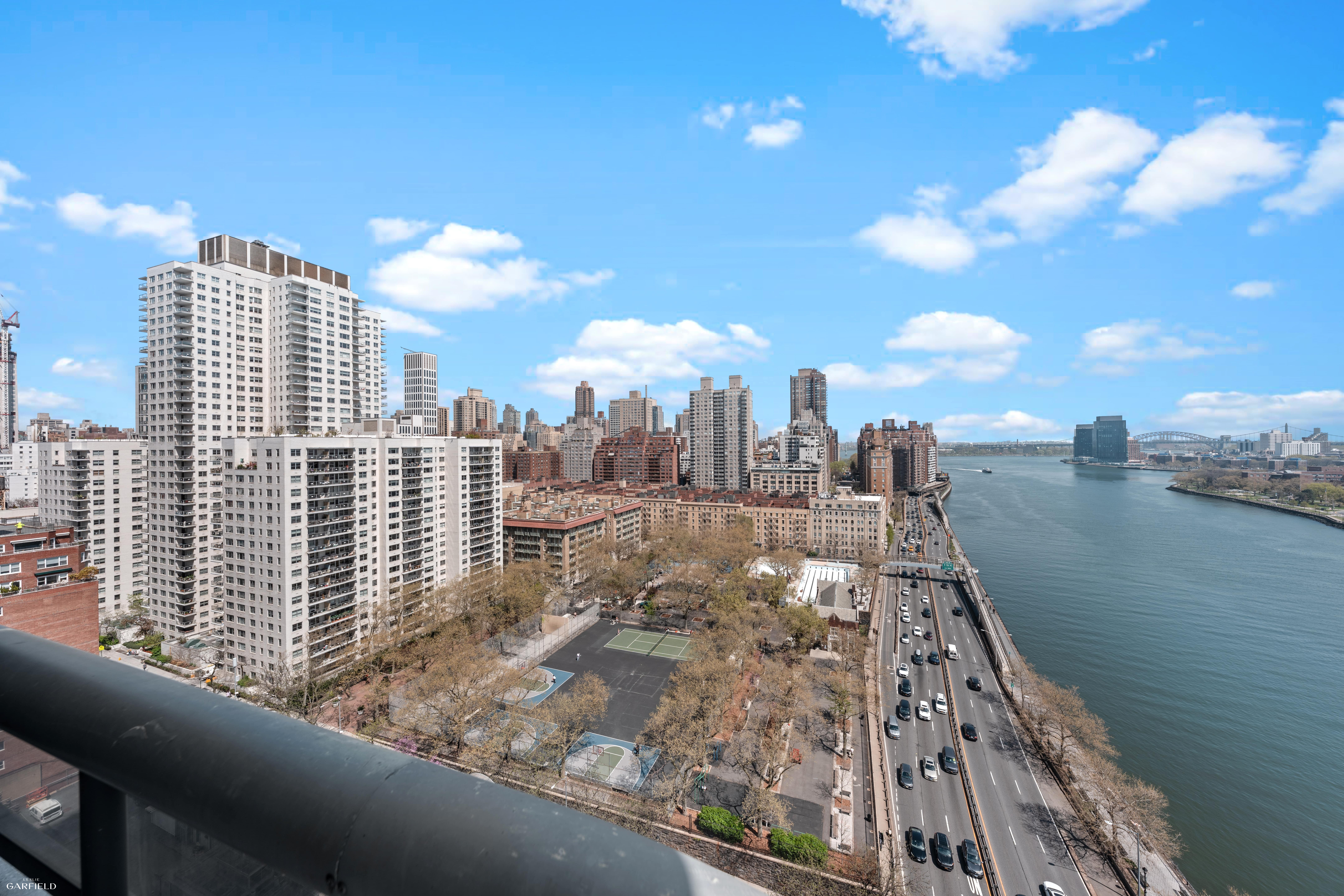 530 East 76th Street, Unit 18G Manhattan, NY 10021 - Photo 8 of 16 a view of a city with tall buildings