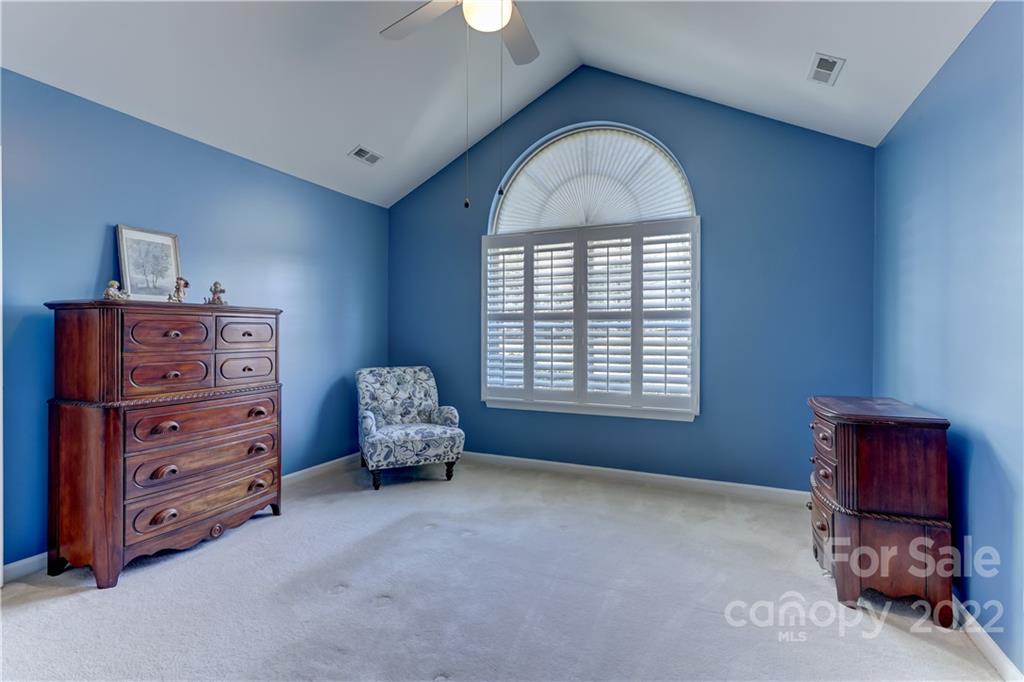 728 Ledgestone Court Tega Cay, SC 29708 - Photo 14 of 30 a living room with furniture and a dresser