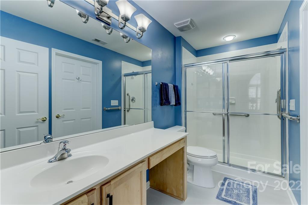 728 Ledgestone Court Tega Cay, SC 29708 - Photo 15 of 30 a bathroom with a sink a toilet and shower