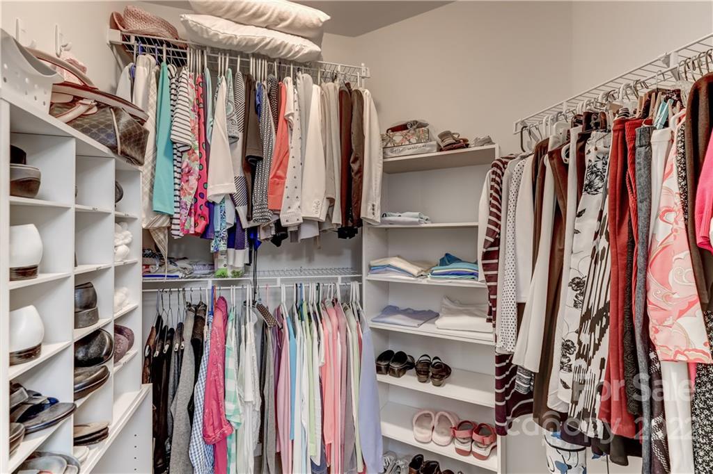 728 Ledgestone Court Tega Cay, SC 29708 - Photo 16 of 30 a view of walk in closet with clothes and shoes