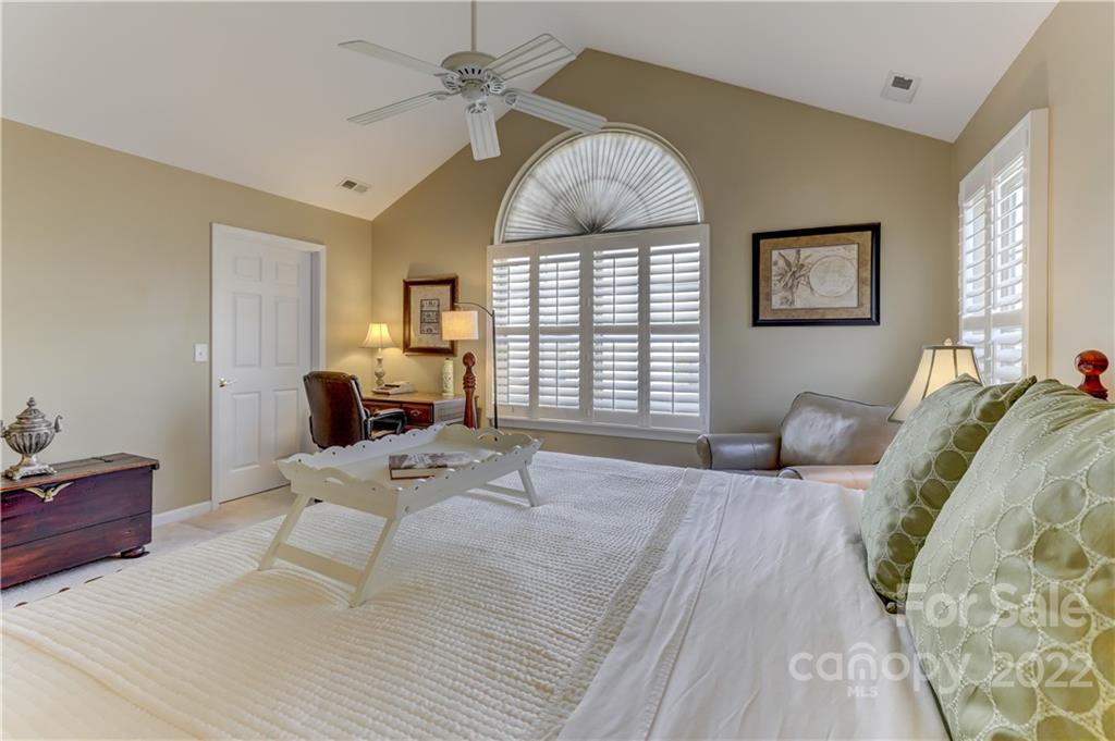 728 Ledgestone Court Tega Cay, SC 29708 - Photo 18 of 30 a bedroom with a bed and a window