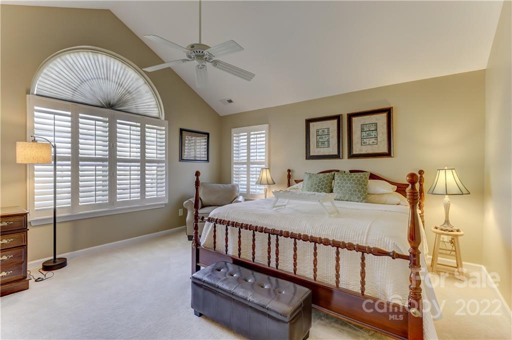 728 Ledgestone Court Tega Cay, SC 29708 - Photo 19 of 30 a bed room with furniture and a window