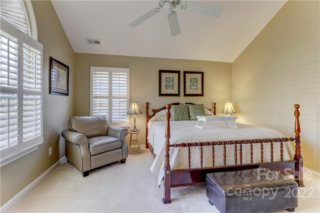 728 Ledgestone Court Tega Cay, SC 29708 - Photo 20 of 30 a bedroom with furniture and a window