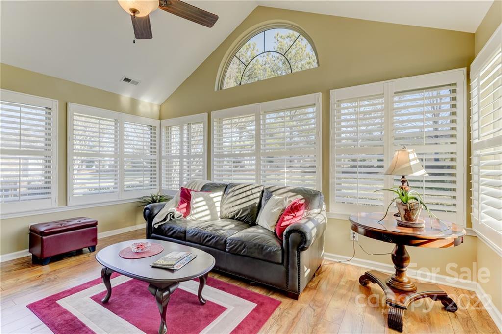 728 Ledgestone Court Tega Cay, SC 29708 - Photo 21 of 30 a living room with furniture and a large window