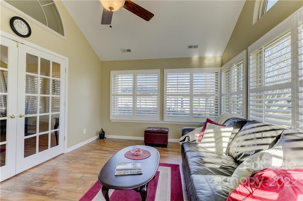 728 Ledgestone Court Tega Cay, SC 29708 - Photo 22 of 30 a bedroom with furniture and a large window