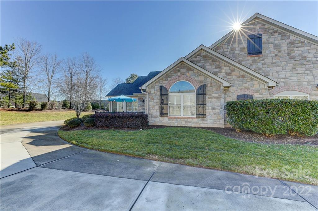 728 Ledgestone Court Tega Cay, SC 29708 - Photo 26 of 30 a view of house with yard and green space