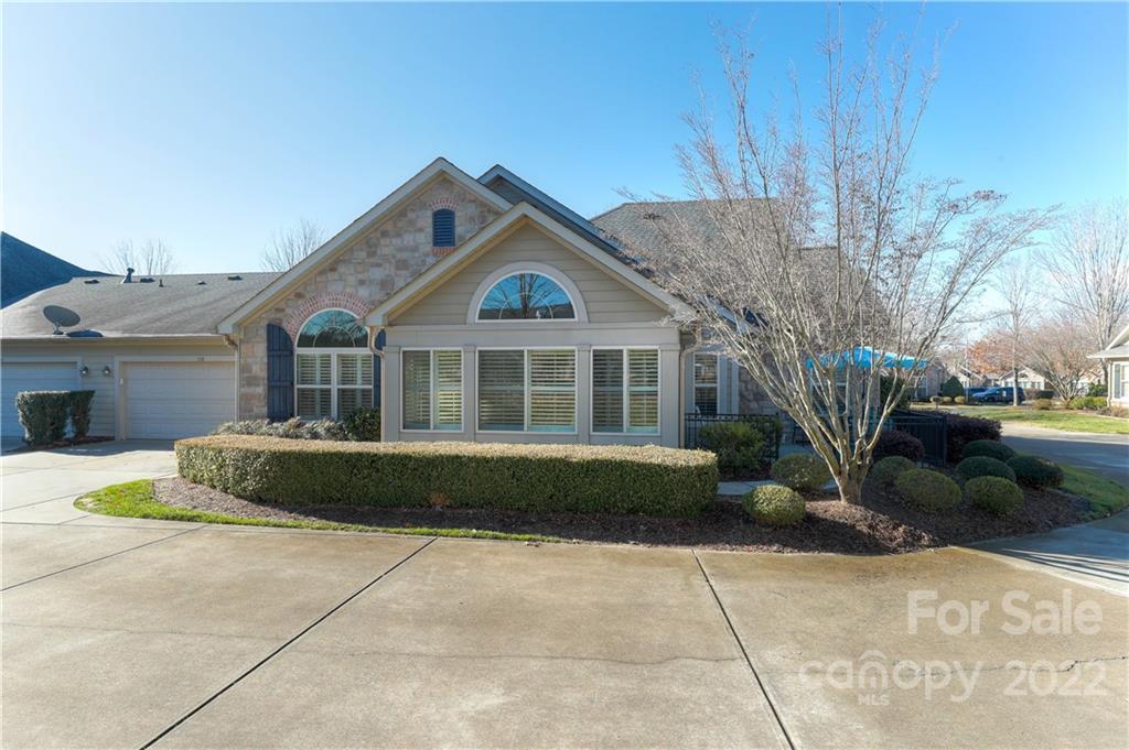 728 Ledgestone Court Tega Cay, SC 29708 - Photo 30 of 30 a front view of a house with a garden