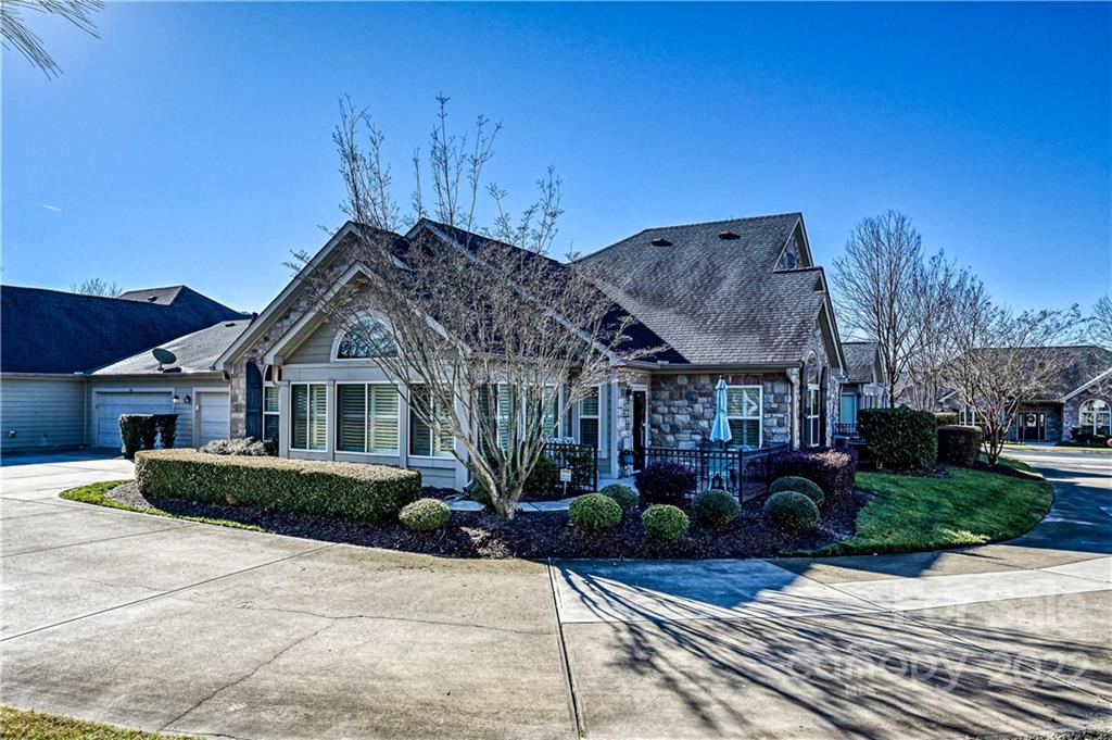 728 Ledgestone Court Tega Cay, SC 29708 - Photo 3 of 30 a front view of house with yard and green space