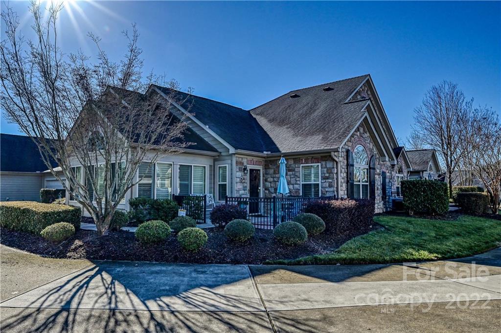 728 Ledgestone Court Tega Cay, SC 29708 - Photo 4 of 30 a front view of a house with garden
