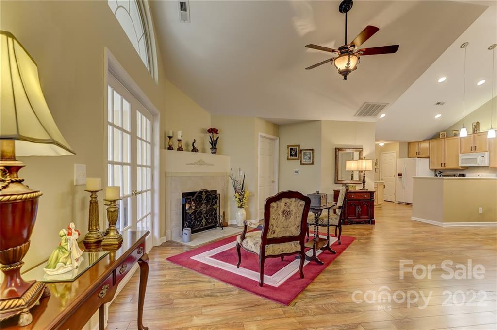 728 Ledgestone Court Tega Cay, SC 29708 - Photo 5 of 30 a living room with furniture and fireplace