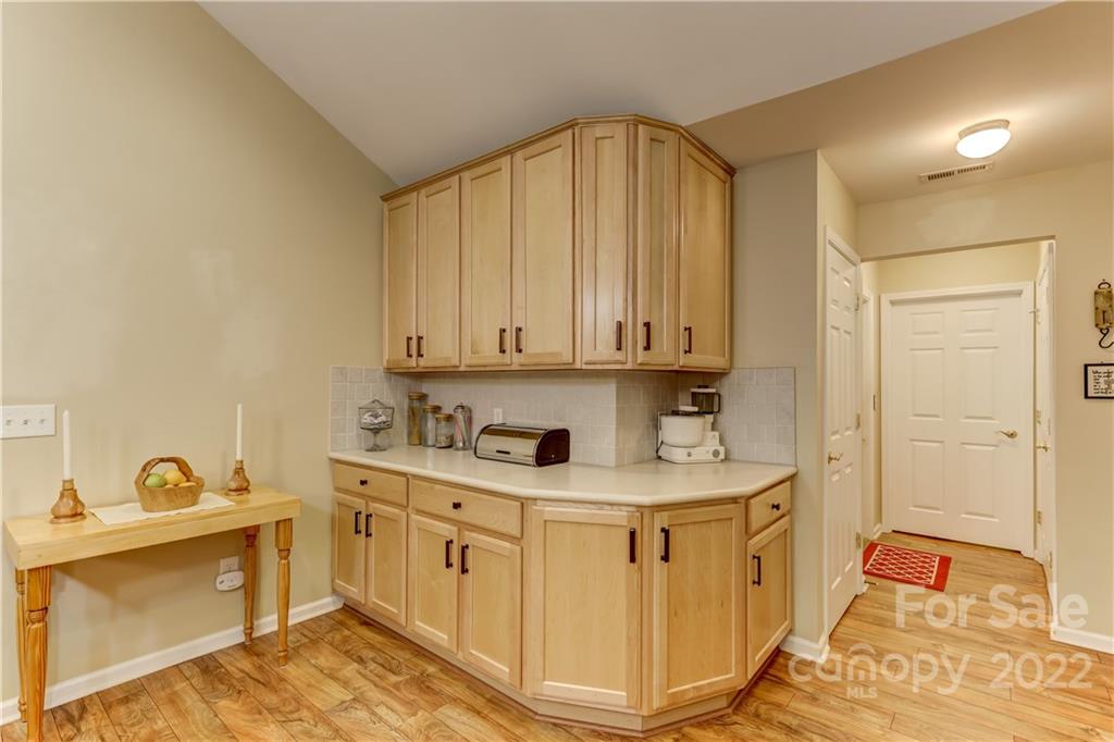 728 Ledgestone Court Tega Cay, SC 29708 - Photo 8 of 30 a kitchen with a sink and cabinets