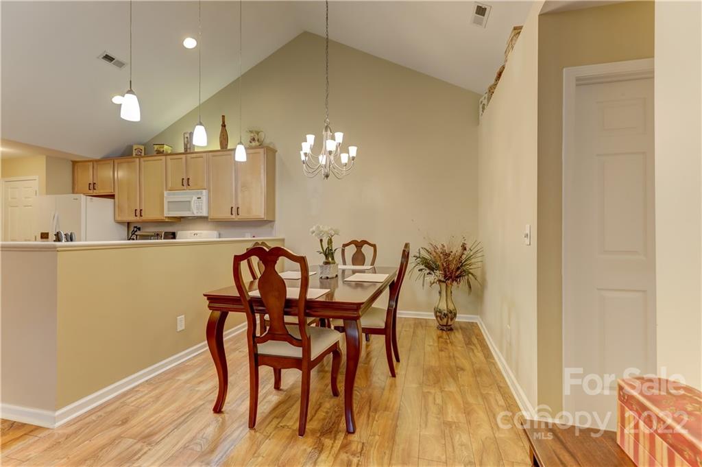 728 Ledgestone Court Tega Cay, SC 29708 - Photo 10 of 30 a dining room with furniture and window