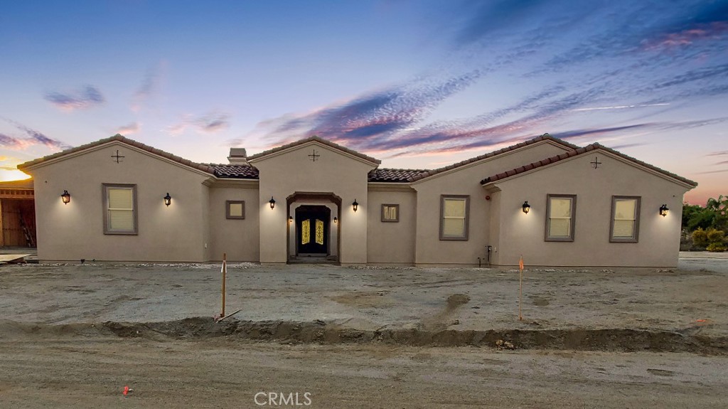 18041 Clarke Court Riverside, CA 92508 - Photo 1 of 1 a front view of a house with a yard