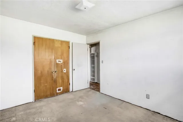 an empty room with closet