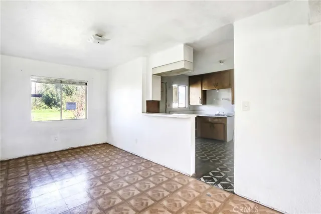 a view of a kitchen cabinets a stove top oven a sink and dishwasher