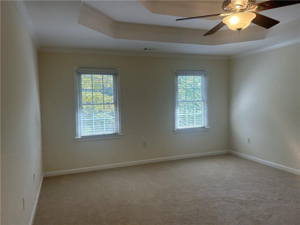 1273 Channel Park Southwest Marietta, GA 30064 - Photo 13 of 69 an empty room with a window and a chandelier fan