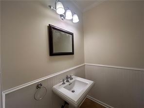 1273 Channel Park Southwest Marietta, GA 30064 - Photo 26 of 69 a bathroom with a sink a light fixture and a mirror