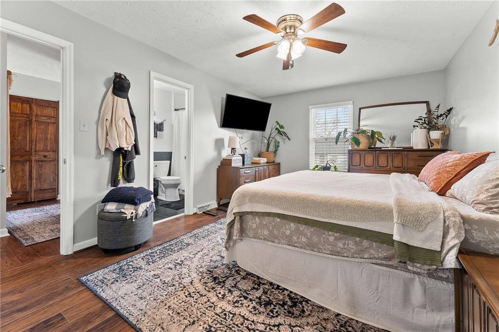 1163 Valleyview Drive Lawrence, PA 15055 - Photo 12 of 25 a bedroom with a bed and a flat screen tv