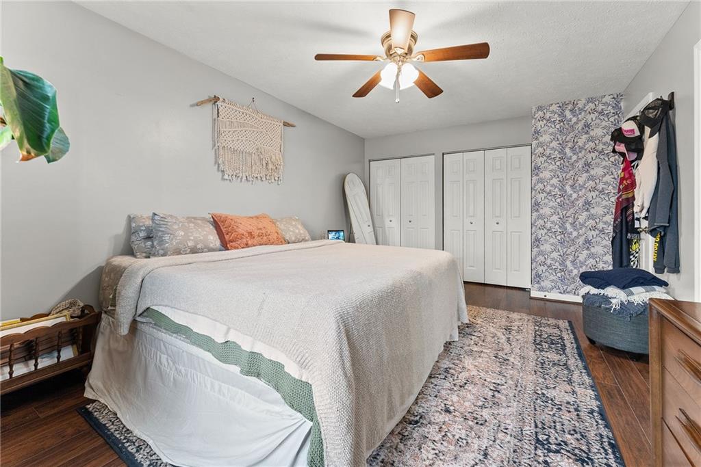 1163 Valleyview Drive Lawrence, PA 15055 - Photo 14 of 25 a bedroom with a bed and a chandelier