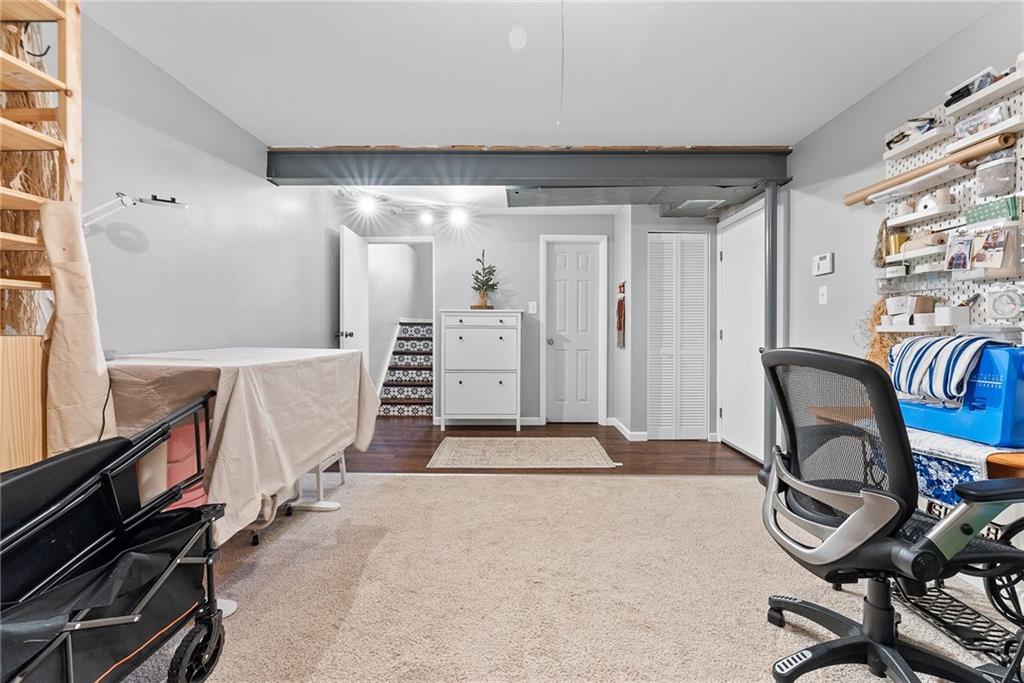 1163 Valleyview Drive Lawrence, PA 15055 - Photo 20 of 25 a view of a livingroom with furniture and staircase