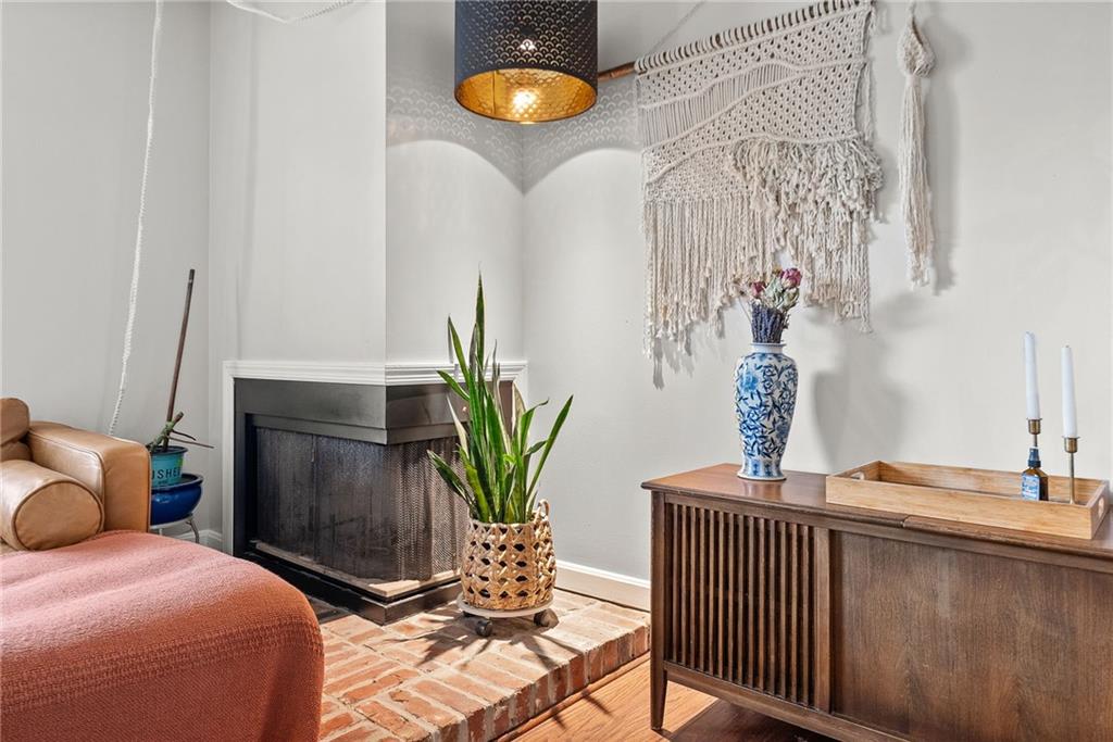 1163 Valleyview Drive Lawrence, PA 15055 - Photo 4 of 25 a bedroom with a bed and potted plant