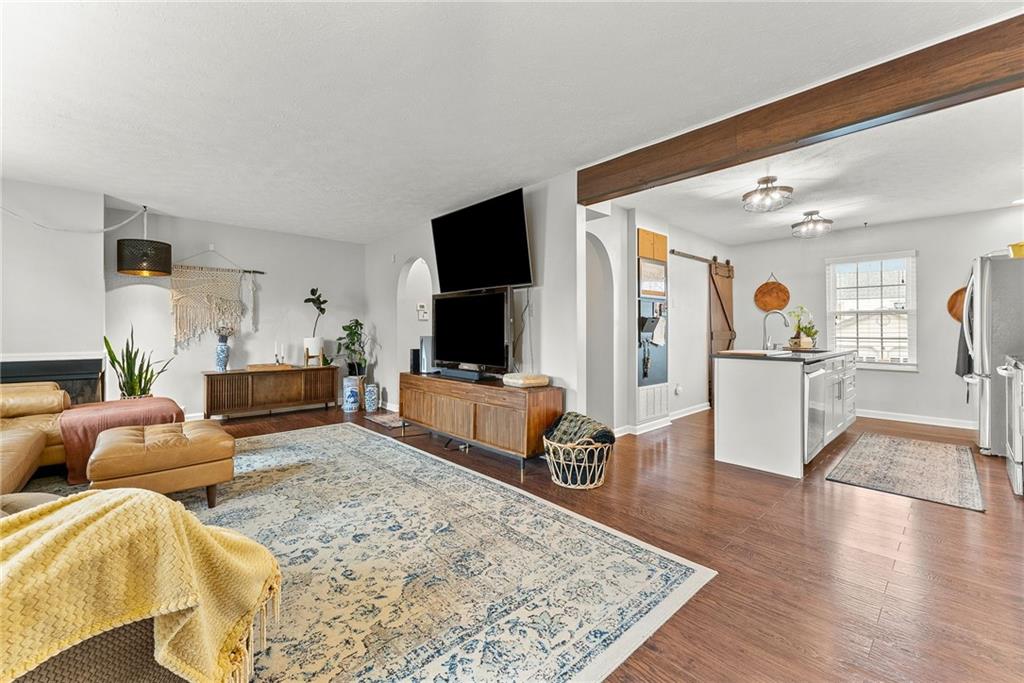 1163 Valleyview Drive Lawrence, PA 15055 - Photo 5 of 25 a living room with furniture and a flat screen tv