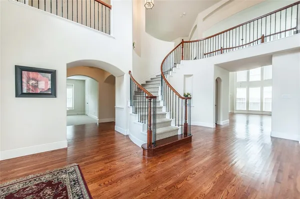 a view of entryway with wooden floor