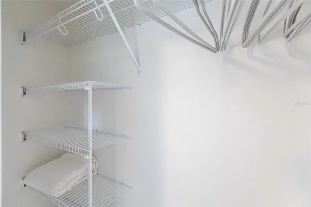 a view of a kitchen with wooden floor