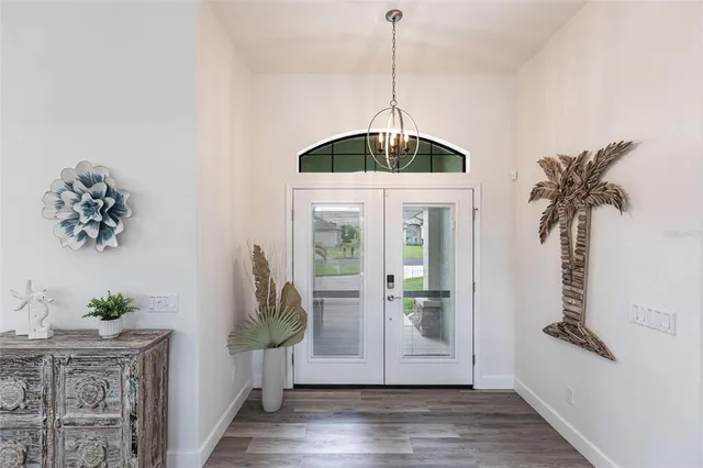 a view of entryway with wooden floor