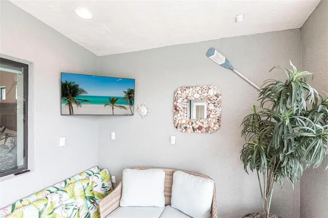 a view of swimming pool with a patio