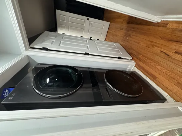 a bedroom with a bed and tv