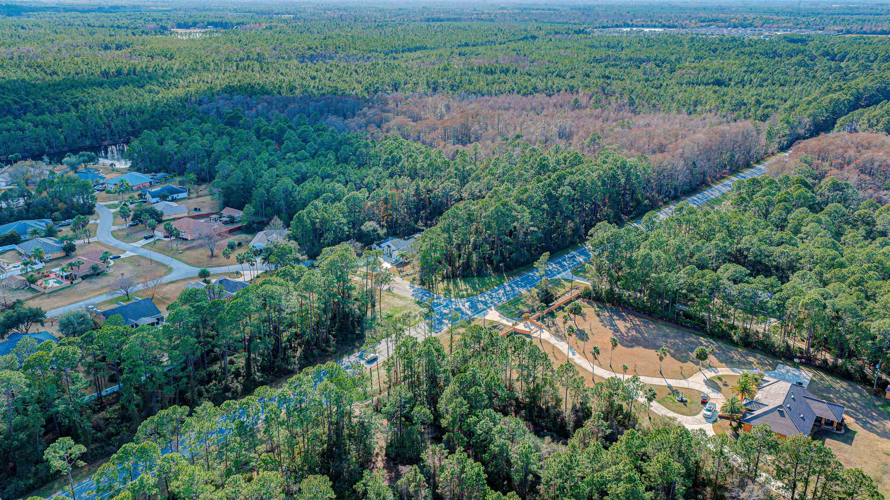 206 E Street St. Augustine, FL 32080 - Photo 4 of 24 an aerial view of residential house with outdoor space and trees all around