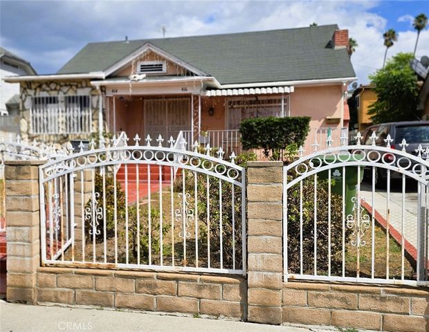 a front view of a house with a balcony