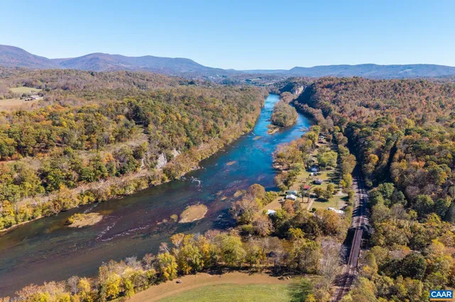 a view of a living room with windows