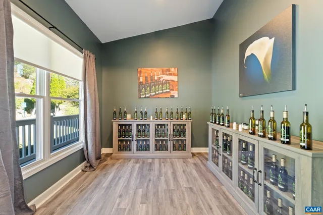 a bathroom with a toilet a sink and a mirror