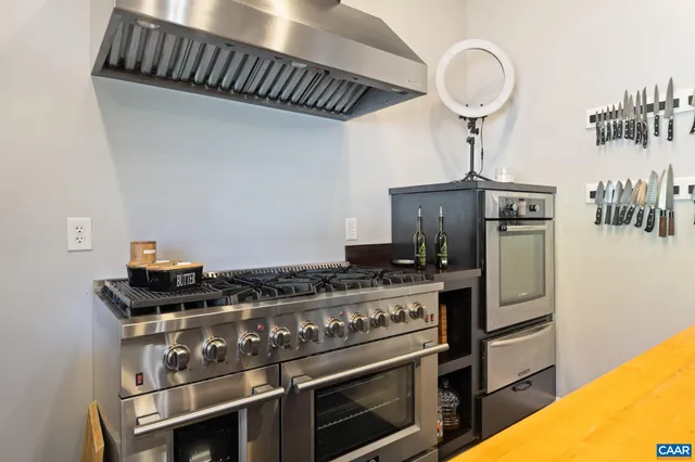a view of a balcony with wooden floor