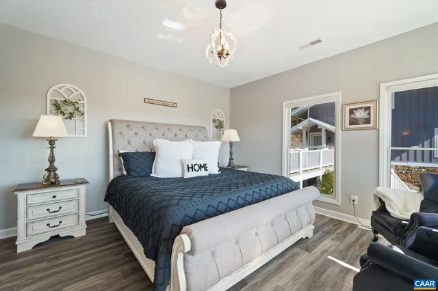 a bathroom with a granite countertop sink mirror and vanity