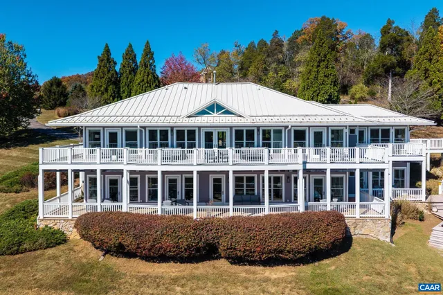 a view of balcony with wooden floor