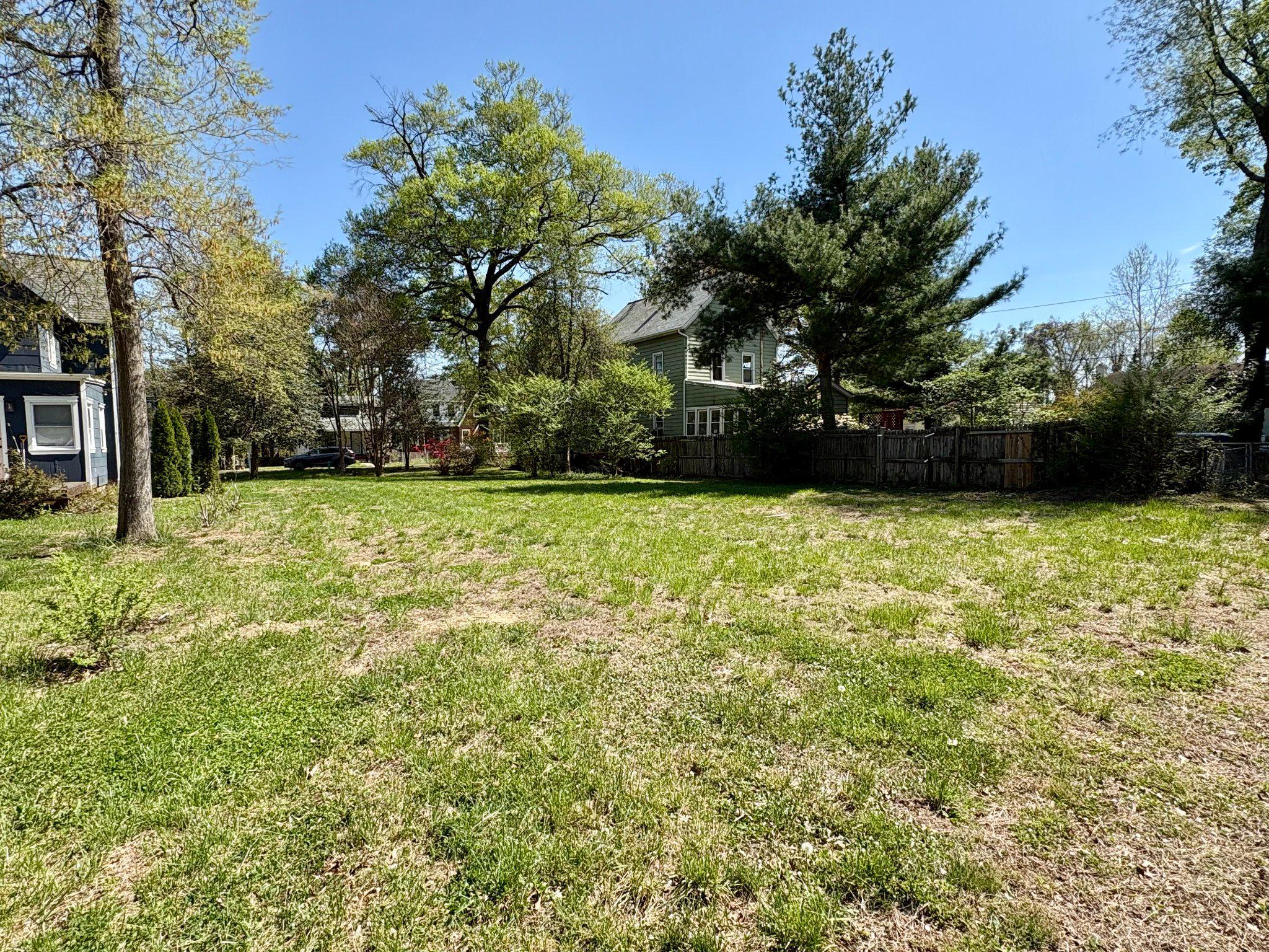 4702 Banner Street Hyattsville, MD 20781 - Photo 13 of 20 a view of a green field with trees in the background