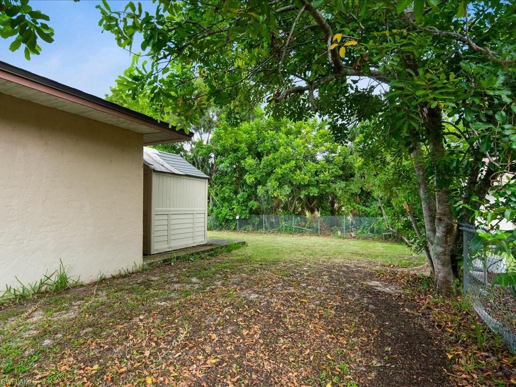 4865 22nd Avenue Southwest Naples, FL 34116 - Photo 19 of 20 a view of a house with a tree